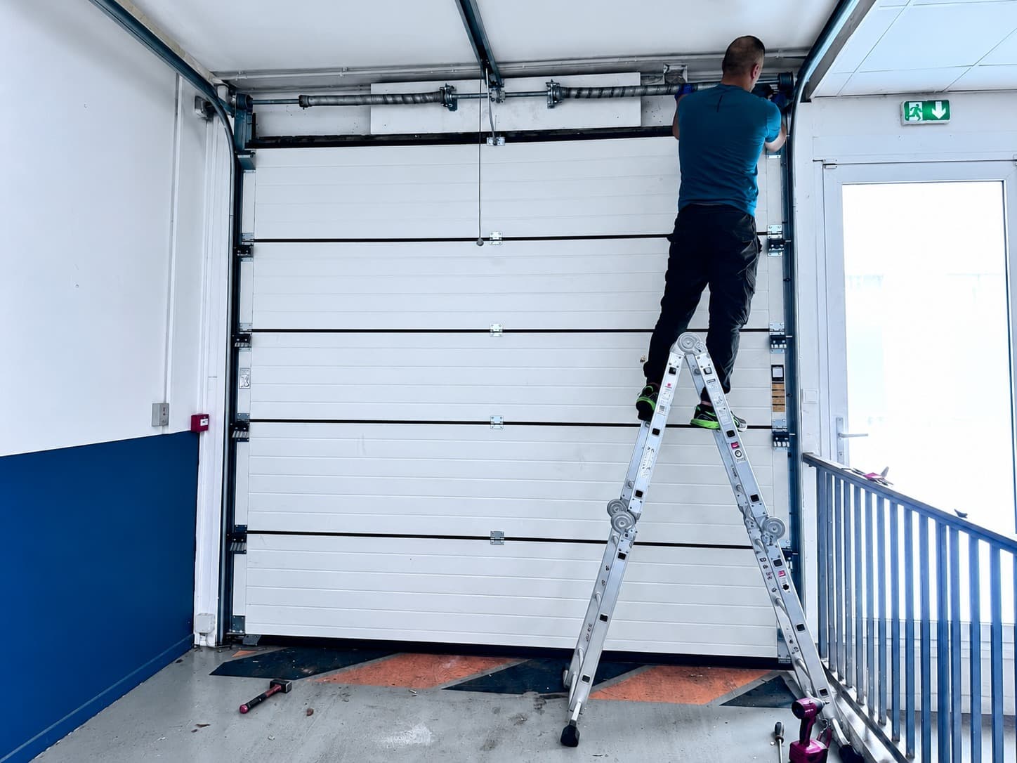 Diagnostic du mécanisme d'une porte de garage avant réparation